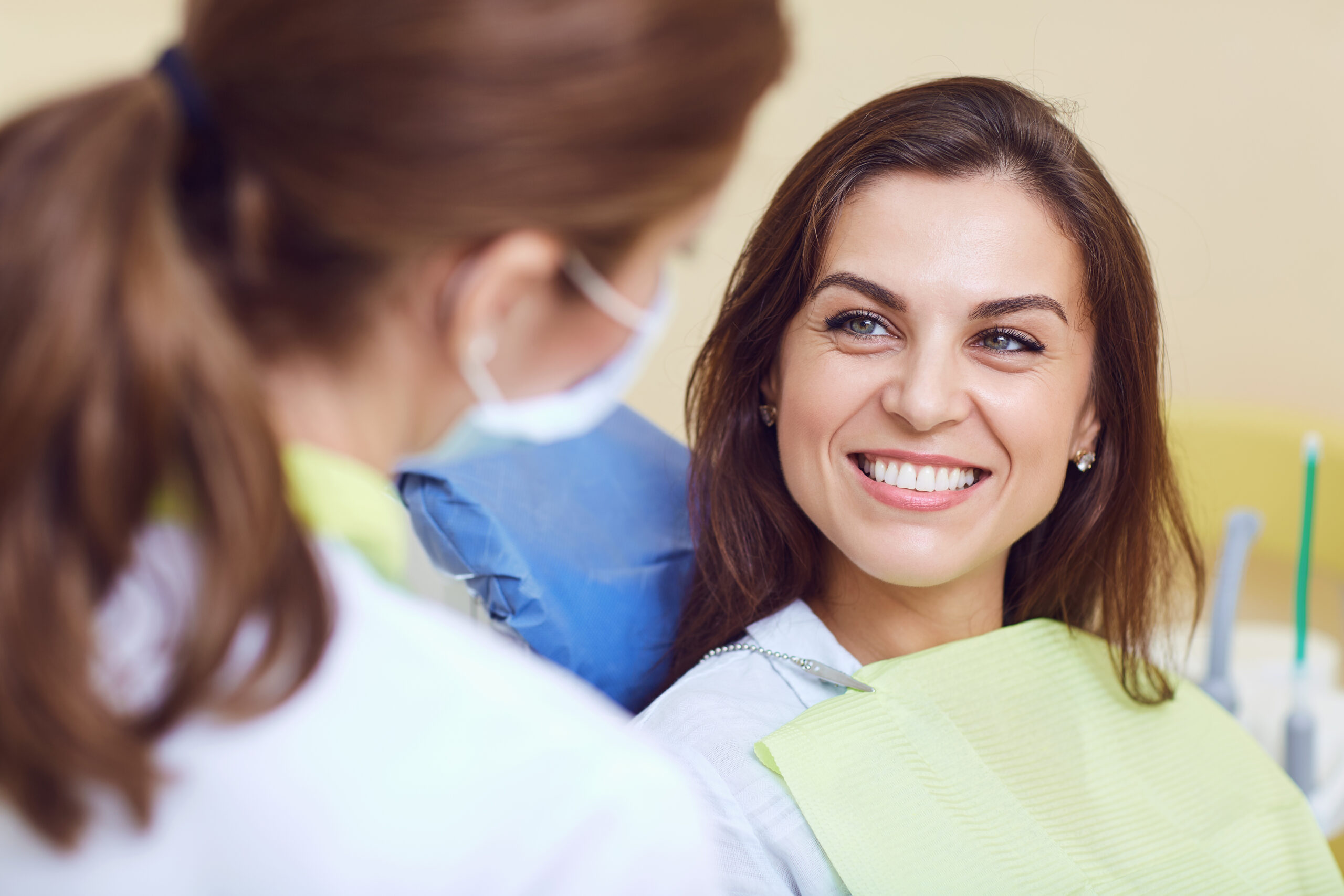 A girl and a dentist in a dental clinic.